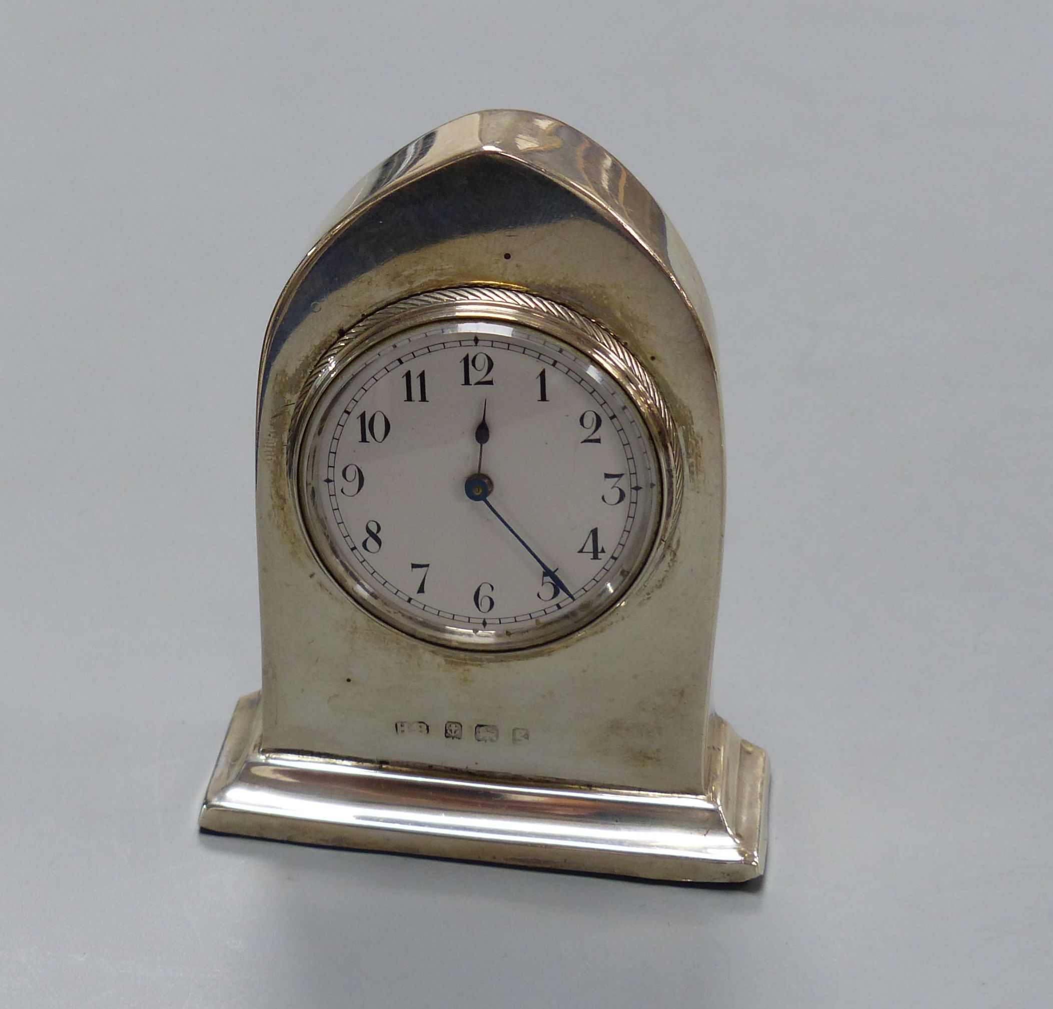 An Edwardian silver mounted lancet miniature timepiece, Birmingham, 1906, 71mm.
